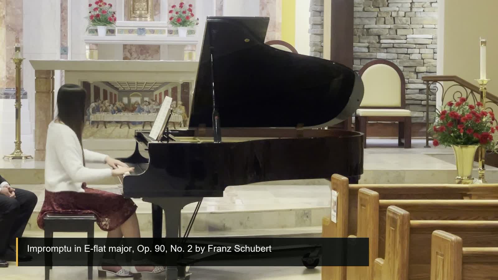 A still from Jocelyn's piano performance